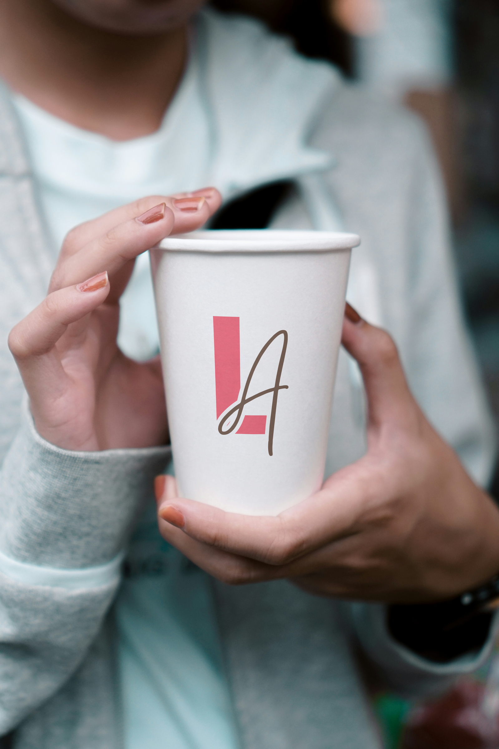 love always paper cup in hand mockup
